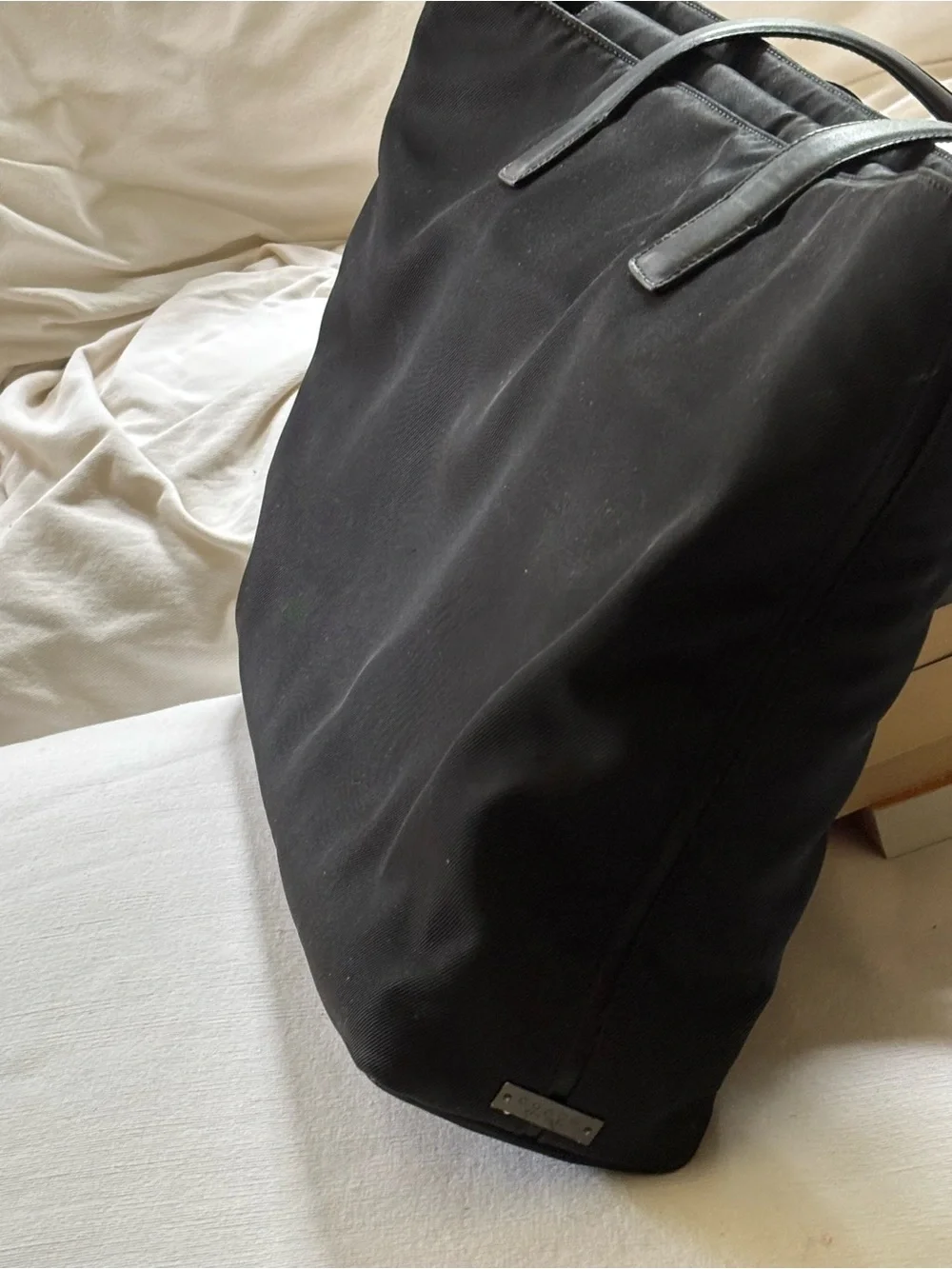 Coach Classic Women’s Laptop/Black Canvas Tote with Smooth Leather Handles.